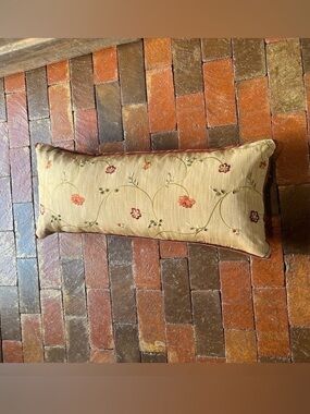 Vintage feather bolster pillow embroidered floral 28“ long X take a  11” wide